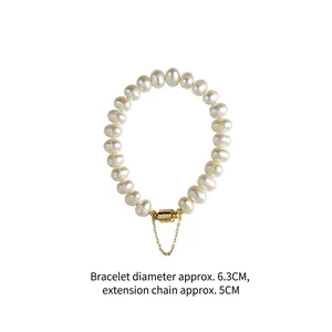 Freshwater pearl bracelet with gold magnetic clasp and extension chain on white background