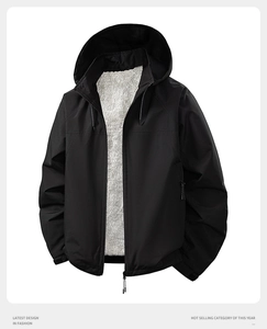 Detail of black hooded jacket with grey fleece lining and adjustable velcro cuffs