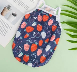 Close-up of breathable mesh pet vest featuring navy strawberry prints and white trim