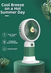 Detail of cute avocado mini fan with USB charging port and one-button operation