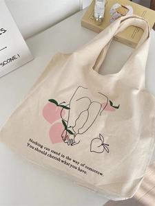 Minimalist canvas tote bag with peach doodle print and aesthetic line art for daily use