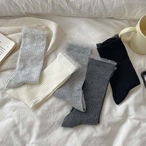 Five-pack of breathable cotton crew socks for women featuring elegant lace trim borders