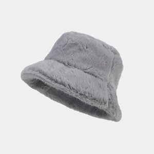 Detailed view of the soft grey faux fur texture and long pile of the winter bucket hat