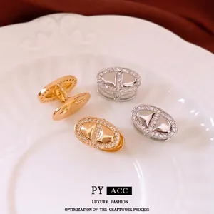 18K gold plated oval earrings with sparkling micro-pave diamonds in gold and silver