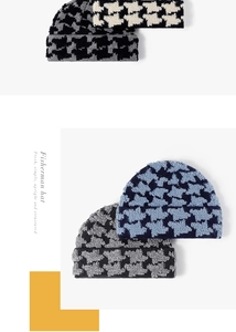 Detailed view of knitted fisherman hats with classic houndstooth patterns in multiple colors