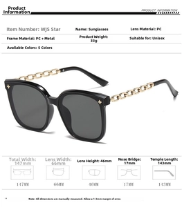 Detail showing oversized black sunglasses with thick gold chain-link metal temples