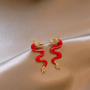 Elegant Red Dragon Tassel Earrings with Gold Edging on Silk Fabric Backdrop
