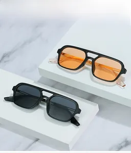 Detail view of W6802 square sunglasses with double bridge and orange transparent lenses
