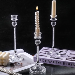 Set of 3 modern glass crystal candle holders with diamond-cut bases and sparkly filling
