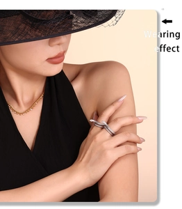 Wearing effect of silver snake-shaped ring with micro-pave stones and textured finish