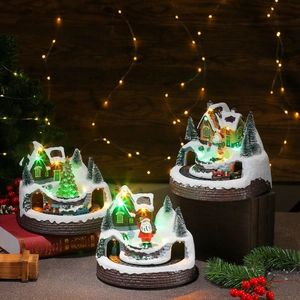 Lighted Christmas resin village with rotating train and music for holiday decor