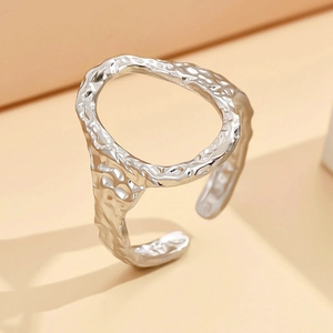 Minimalist silver irregular geometric open ring with hammered texture and hollow circle