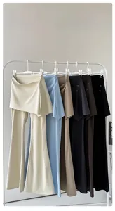 Détail du pantalon de yoga évasé avec jupes amovibles en cinq coloris variés