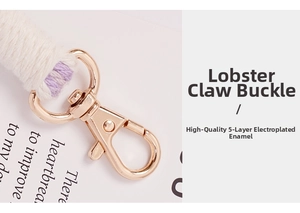Detail of light gold lobster clasp with 5-layer electroplating and woven cotton rope