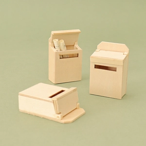 Three miniature wooden dollhouse mailboxes in natural wood finish for DIY Christmas scenes