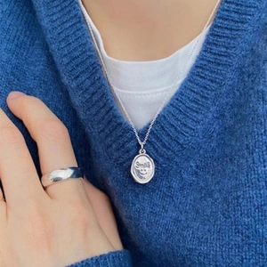 Vintage 925 sterling silver smile pendant necklace and textured ring set on model