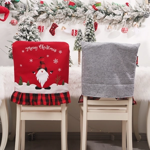 Christmas chair covers featuring gnome designs and Merry Christmas text in red and grey
