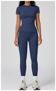 Full view of navy blue slim fit yoga set featuring round neck short sleeve and high waist leggings
