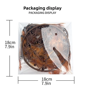 Handmade dream catcher detail with brown feathers and wood beads in packaging, 7.9in size