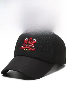Close-up of traditional lion embroidery and laser-perforated breathable mesh on black cap