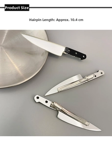 Detail of creative 10.4cm chef knife hair clip with realistic steel finish and duckbill grip