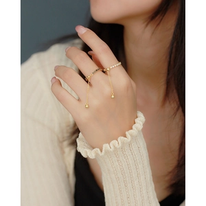 Elegant gold plated S925 silver rings with dangling chains and sparkling zircons