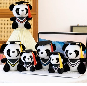 A collection of graduation panda plush toys in various sizes with caps and tassels