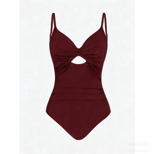 Detail of wine red one-piece swimsuit with V-neck, front cutout, and ruched tummy control
