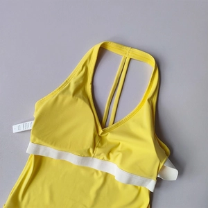 Soutien-gorge de sport dos nu jaune citron avec bande blanche et décolleté en V