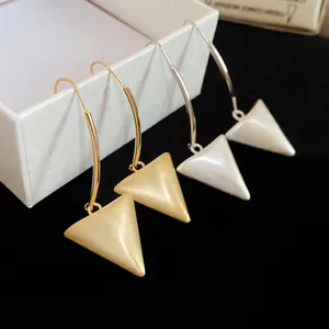 Minimalist 18k brushed metal triangle drop earrings in gold and silver finish