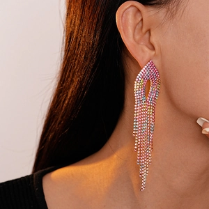 Close-up of elegant gradient colorful rhinestone tassel earrings on a female model