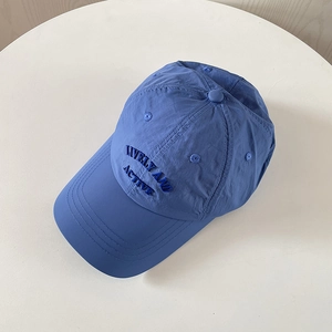 Detailed view of breathable blue nylon baseball cap featuring Lively and Active embroidery