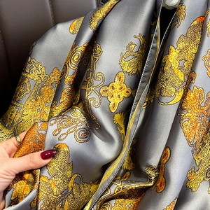 Classic gray faux silk scarf with gold floral patterns and a silky lustrous finish