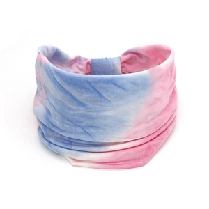Detail of pink and blue tie-dye cotton headband showing soft fabric texture and pattern