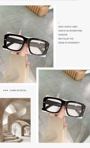 Detail view of square black sunglasses showing frame dimensions 53-21-142 on the temple