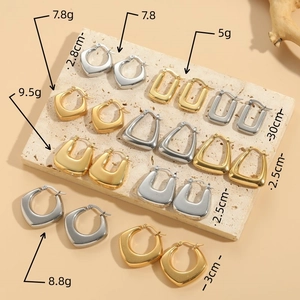 Polished geometric titanium steel earrings set in gold and silver finishes
