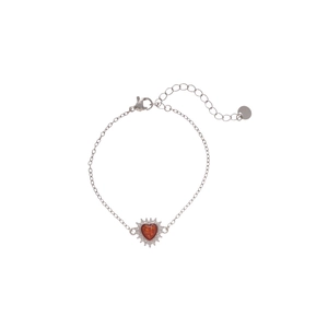 Silver bracelet with a heart zircon pendant featuring red gemstone and adjustable chain link