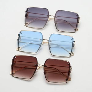 Three pairs of metal square sunglasses with purple and blue gradient lenses stacked together