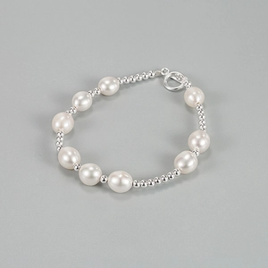 Elegant baroque freshwater pearl bracelet with silver beads and OT toggle clasp closure