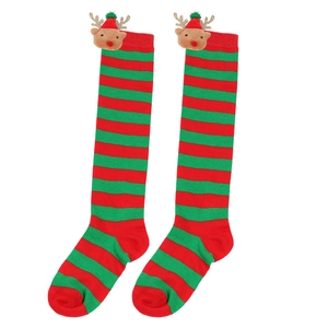 Close-up of festive red and green striped Christmas socks with 3D reindeer doll detail