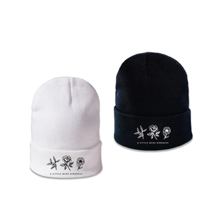 Winter knitted beanie hats with floral embroidery and A Little More Kindness slogan