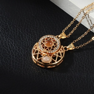 Magnetic sun and moon pendant necklace for couples with gold plating and gemstone inlay