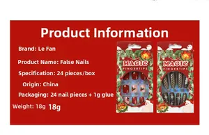 Detailed view of red French Christmas nail tips with snowflake and heart patterns