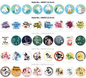 Detail showing five varied 2.5cm round Happy Birthday and festival sticker designs