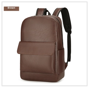 Close-up of brown PU leather backpack texture with detailed stitching and zippers