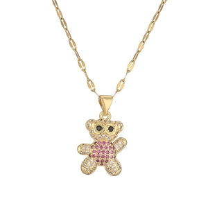 Cute cartoon bear pendant necklace in gold finish with pink and clear cubic zirconia
