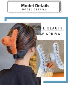 Detail of plush faux fur shark hair clip in orange and light blue for thick hair