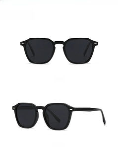 Classic black polarized round frame sunglasses with silver rivet accents and geometry design