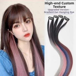 Detail of gradient ombre clip-in hair extensions in pink, blue, gray and purple tones