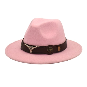 Detail of pink wool fedora featuring a brown leather band and silver bull head metal buckle